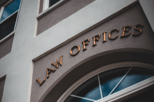 Exterior sign reading 'Law Offices' on a law firm building, representing trust accounting compliance for law firms.